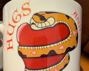 Hugs and Hisses Reboot Mug